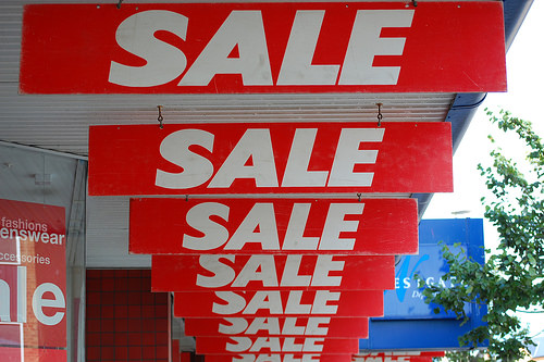 store sale signs photo