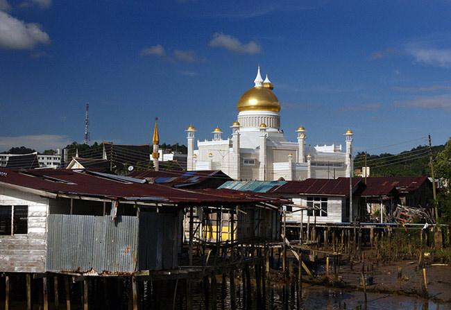 The means are there. Down the street from the Guiness book of World record largest palace in the world is this mosque surrounded by shacks. In Brunei. See Bernard Spragg.